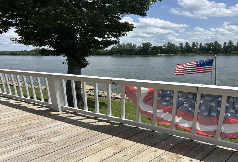 Wooden deck with a water view Wooden deck with a water view