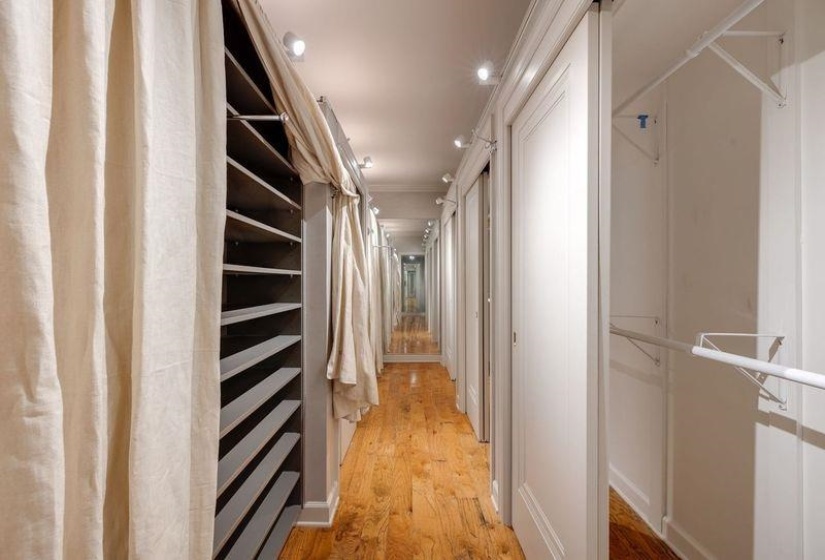 Walk in closet featuring light wood-type flooring