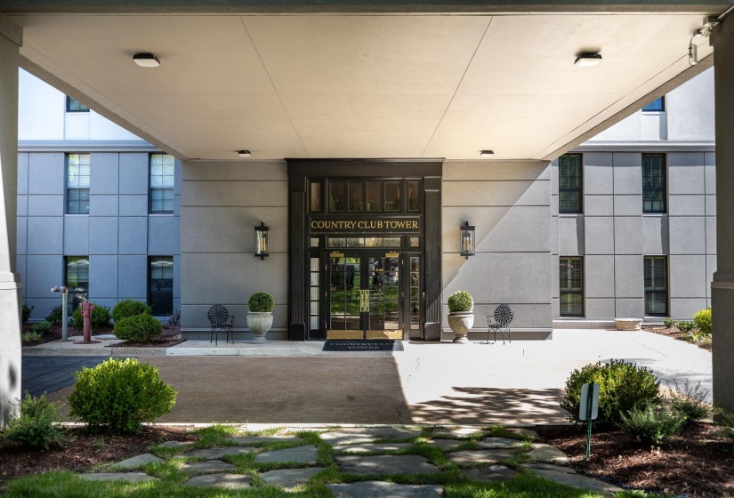 Property entrance with stucco siding