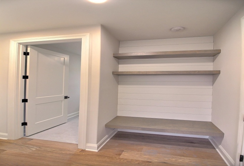 Mudroom featuring light hardwood