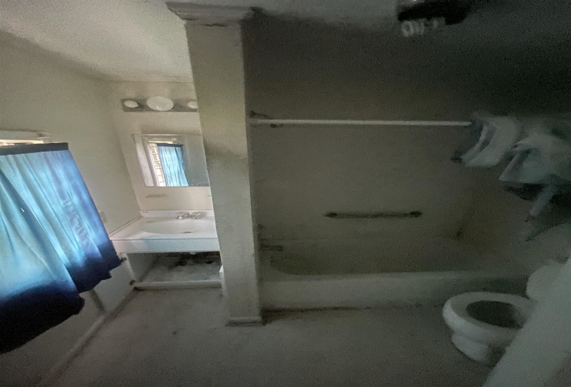 Full bathroom featuring toilet and shower / bathing tub combination