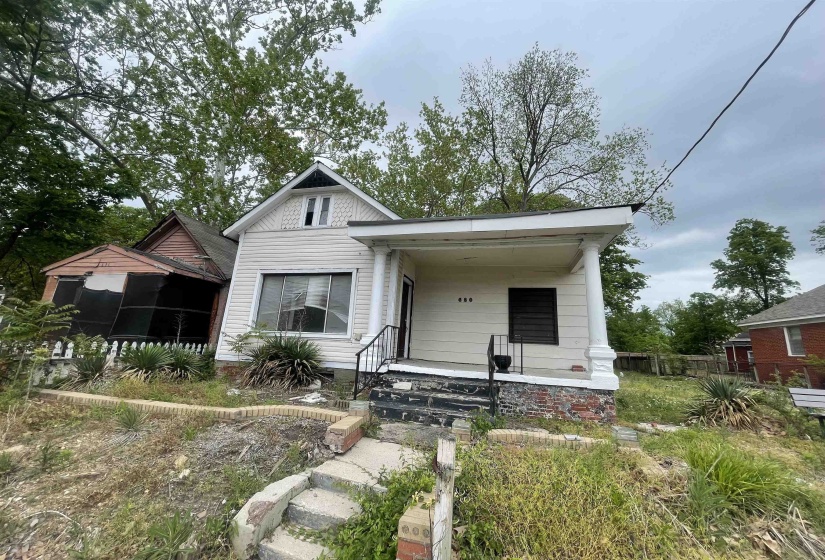 Bungalow featuring covered porch