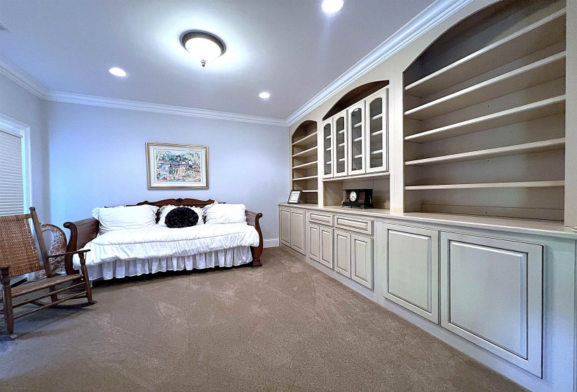 Bedroom featuring ornamental molding, light carpet, and recessed lighting