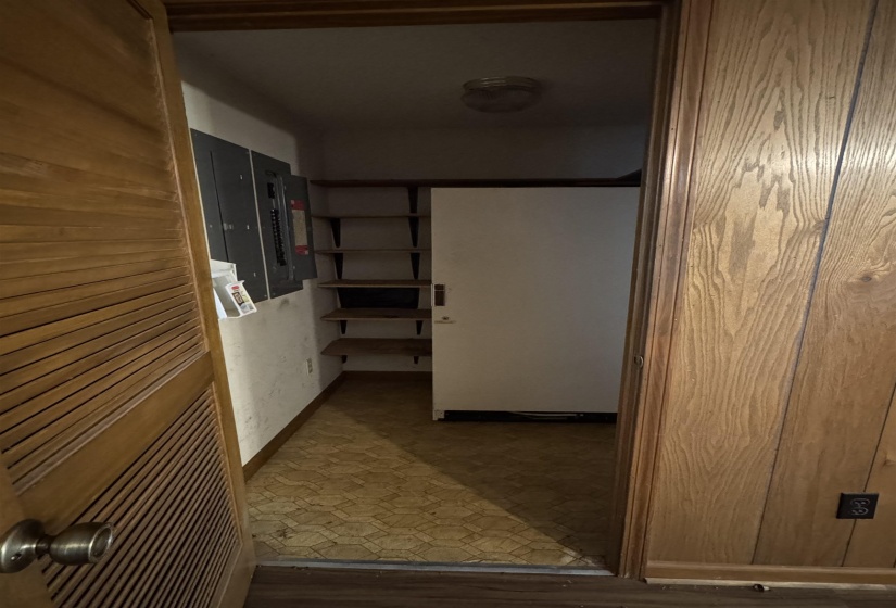 Corridor featuring electric panel