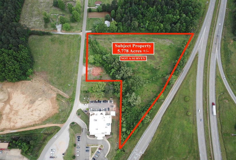 Aerial map of property and surrounding area with property parcel outlined