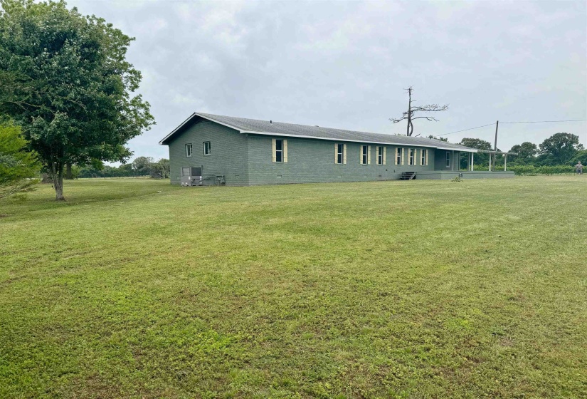 View of home's exterior featuring a yard