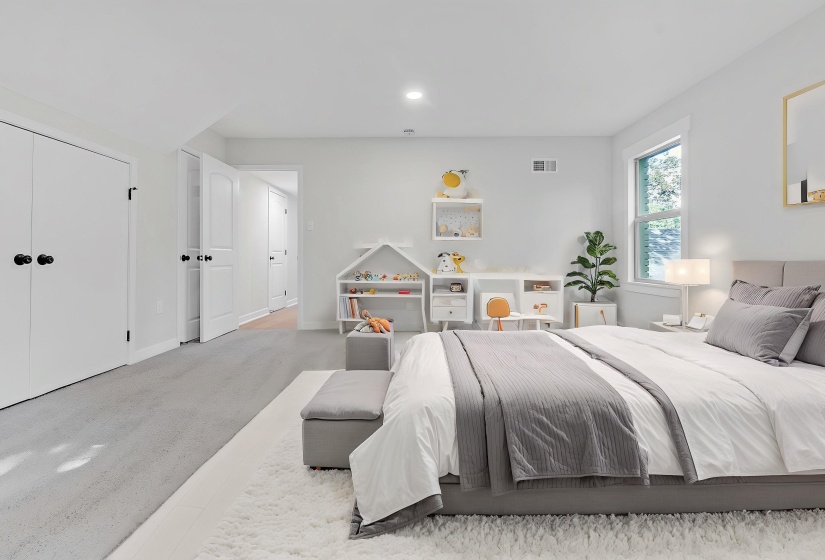 Bedroom featuring recessed lighting and baseboards