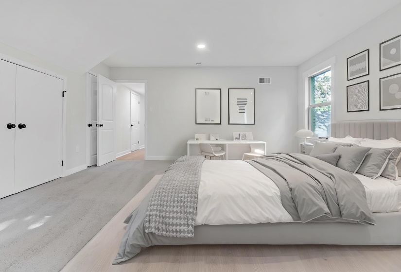 Carpeted bedroom featuring baseboards and recessed lighting