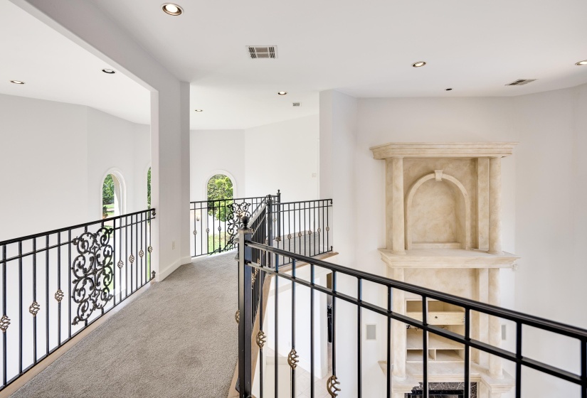 Hallway with carpet, recessed lighting, an upstairs landing, and baseboards