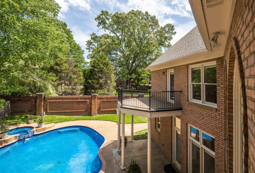 View of pool featuring a fenced backyard, a patio, and a pool with connected hot tub