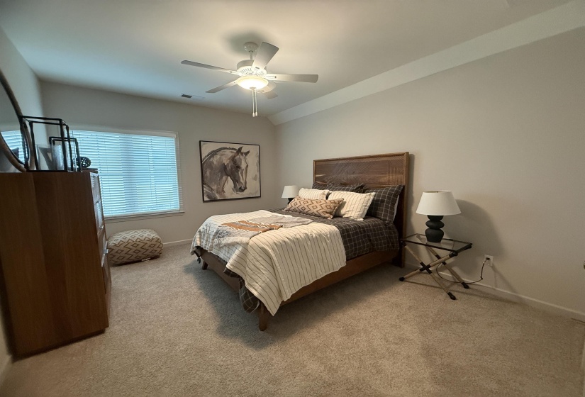 Bedroom with carpet floors and ceiling fan
