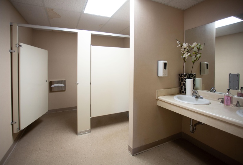 Bathroom featuring sink and a paneled ceiling