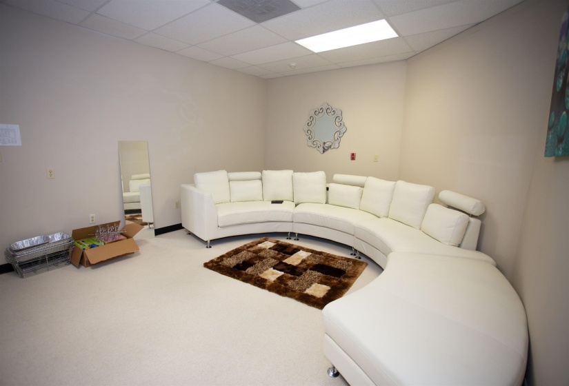 Office featuring a drop ceiling