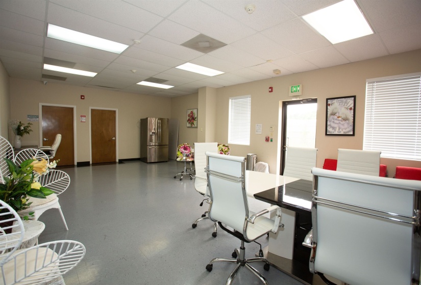 Home office featuring a drop ceiling