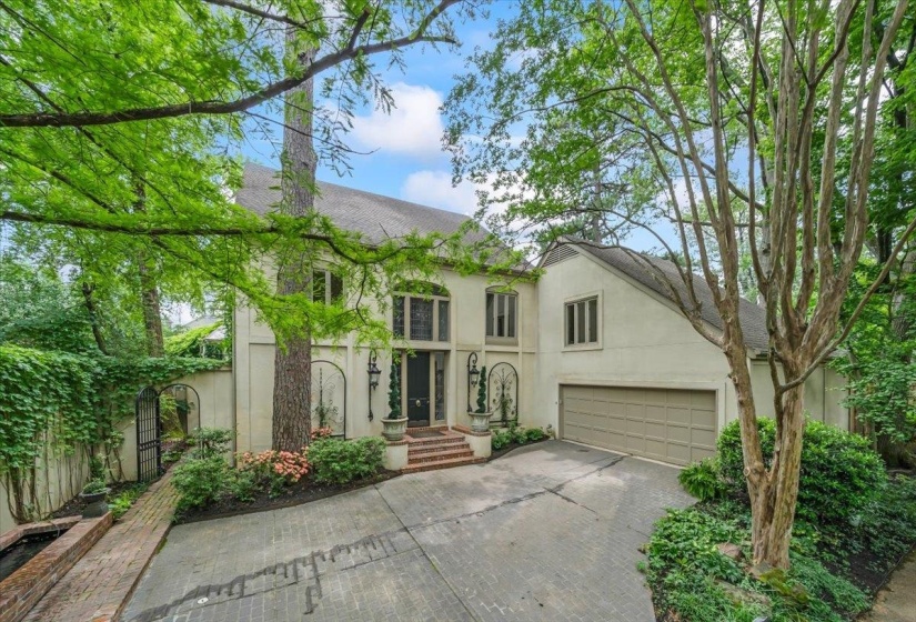 OPEN HOUSE SUNDAY Aug 8th 1:30-3pm. View of front of home with stucco siding, driveway, a garage, and a shingled roof