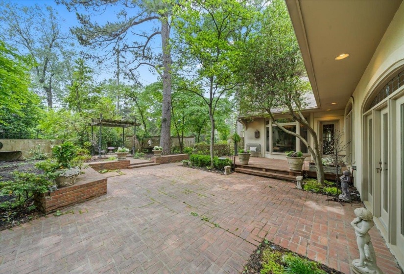 View of patio with fence, a deck, and a pergola