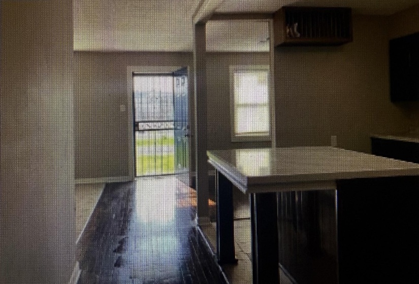 Kitchen featuring tile walls