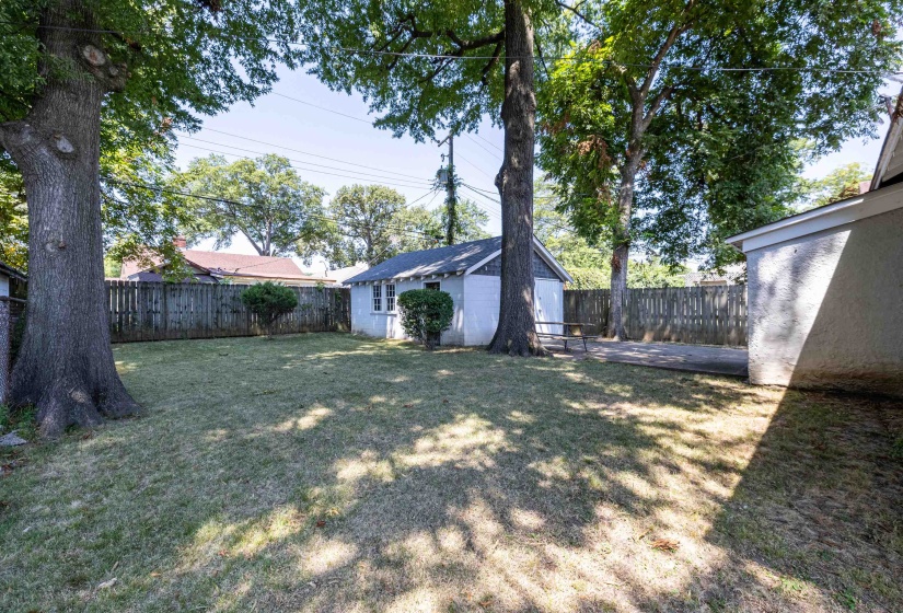 View of yard with an outbuilding
