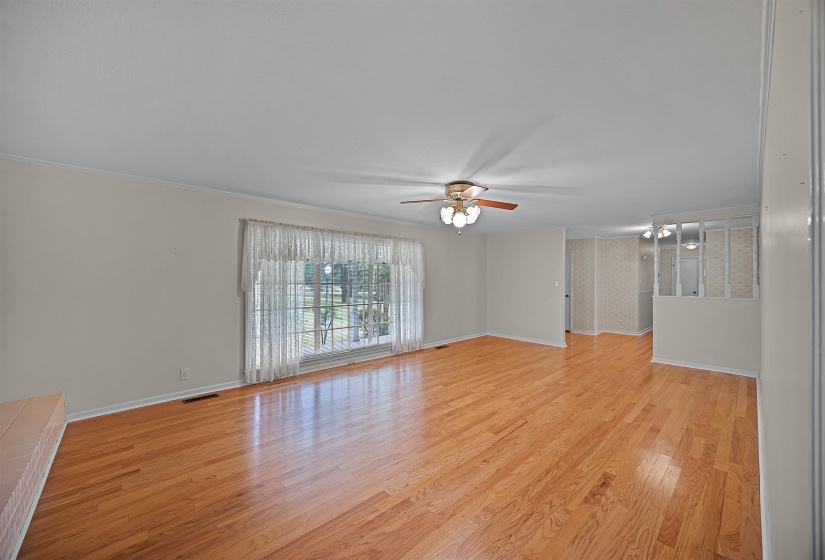 Spare room featuring light hardwood / wood-style flooring and ceiling fan