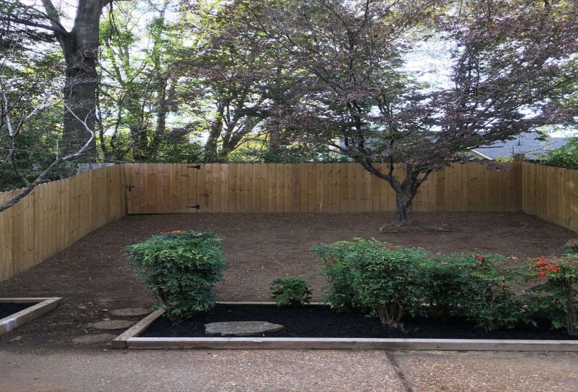 View of yard featuring a fenced backyard