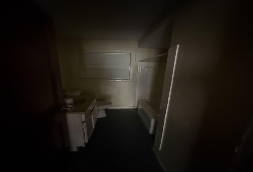 Full bathroom featuring vanity, toilet, and shower / washtub combination