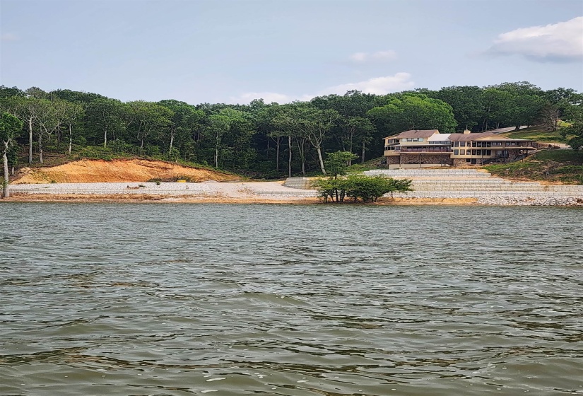 Water view featuring a forest