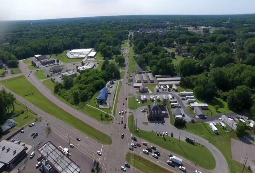View of property location with a forest
