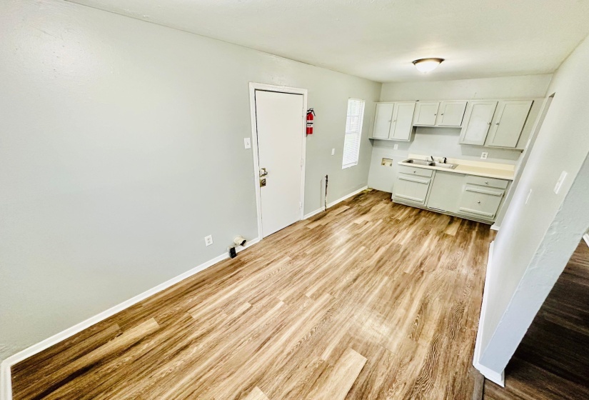 Kitchen featuring light hardwood / wood-style flooring and sink