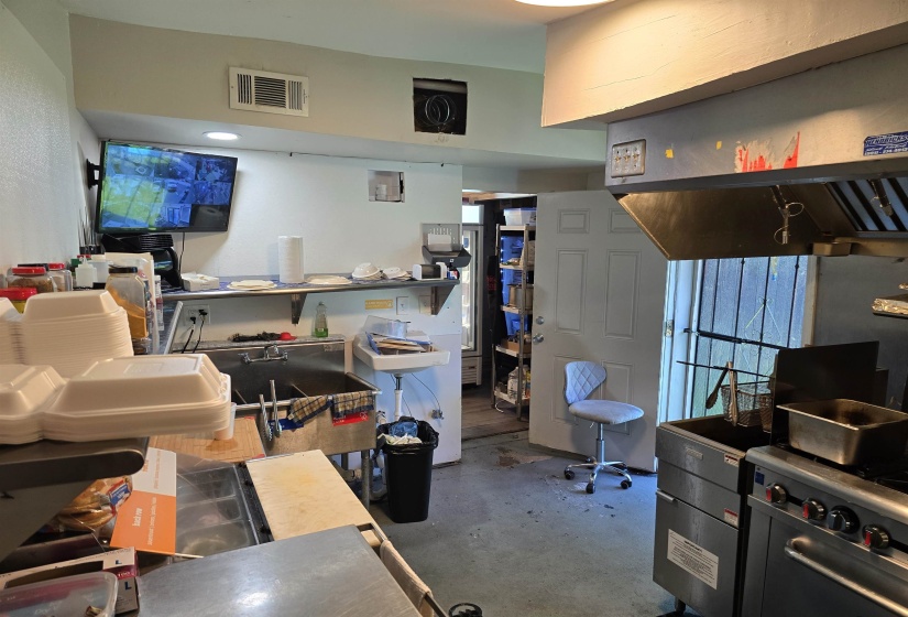 Miscellaneous room with concrete floors