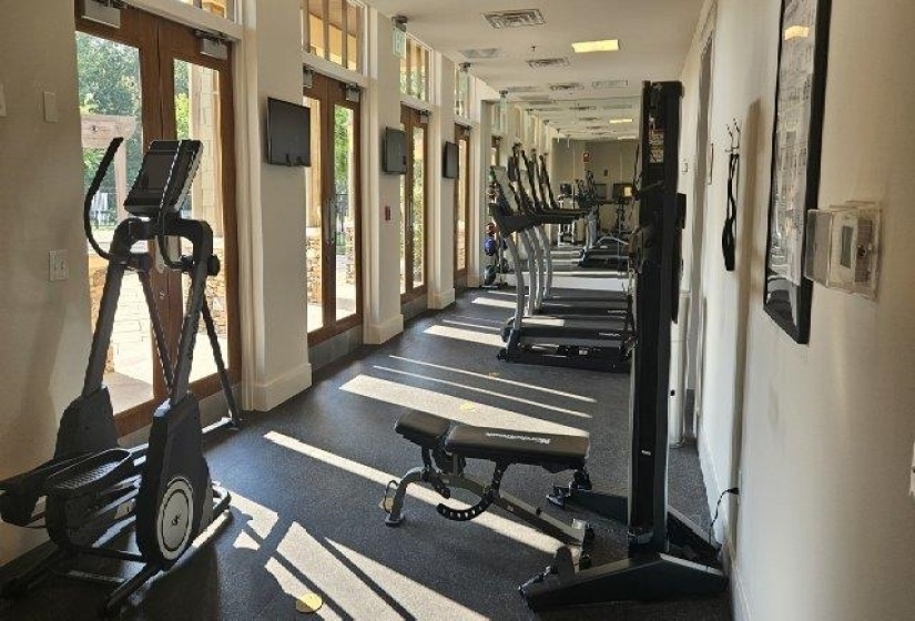 Gym featuring french doors