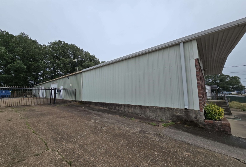 View of property exterior with board and batten siding