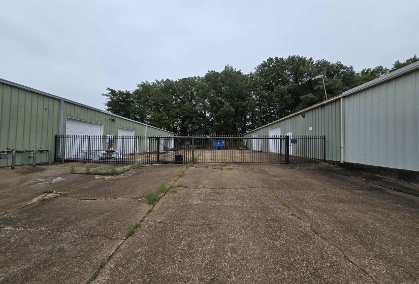 View of car parking with a garage