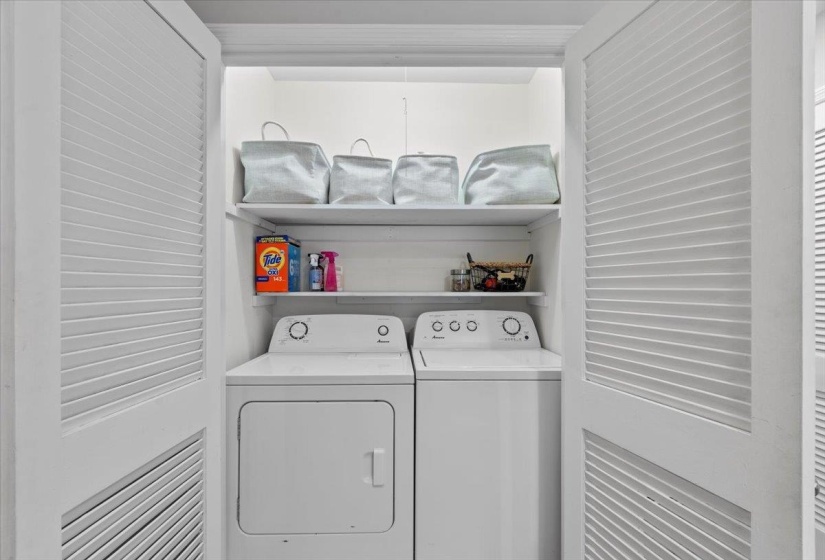 Washroom featuring independent washer and dryer
