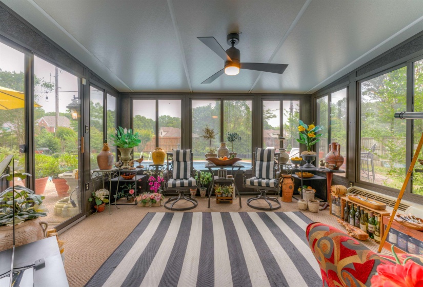 Sunroom featuring carpet