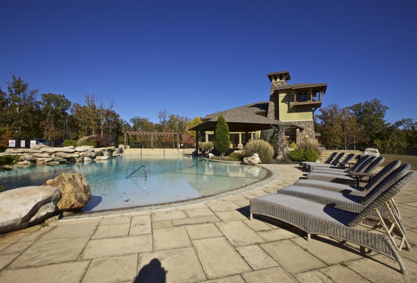 Outdoor pool with a patio area