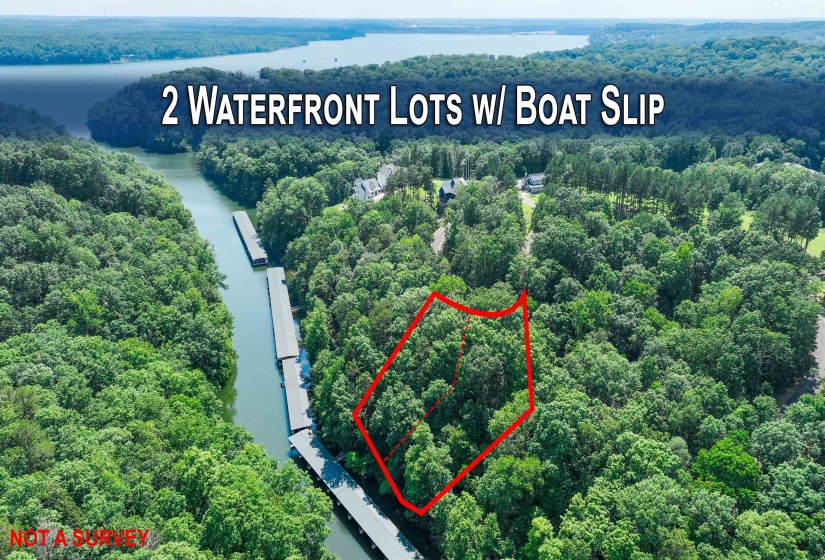 Aerial view of property's location featuring property parcel outlined and a nearby body of water