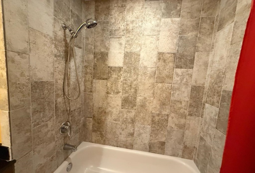 Full bathroom featuring  shower combination