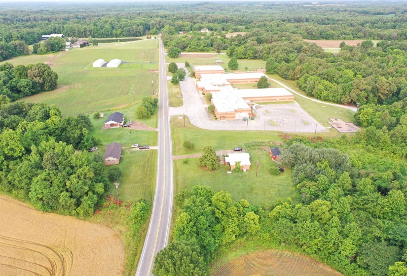 Aerial overview of property's location with a forest