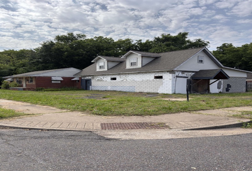 View of front of property featuring roof with shingles