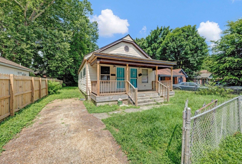 Shotgun-style home with covered porch