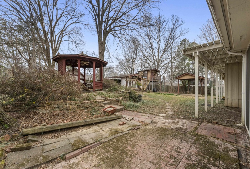 View of yard with a gazebo and a patio