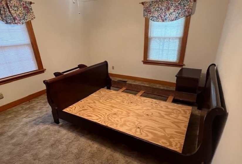 Bedroom featuring carpet flooring