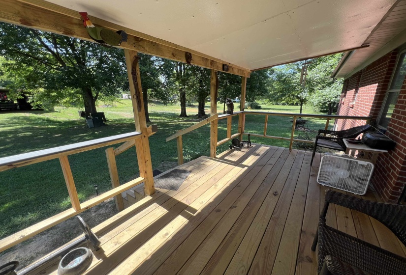 Wooden deck with a lawn