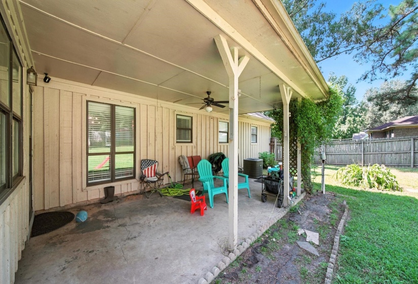 View of patio featuring ceiling fan