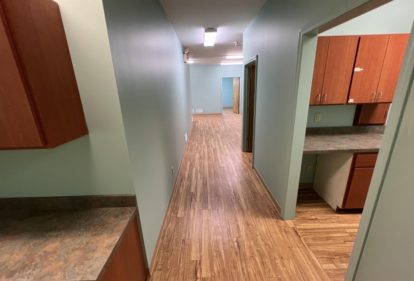 Hall featuring light wood-style floors