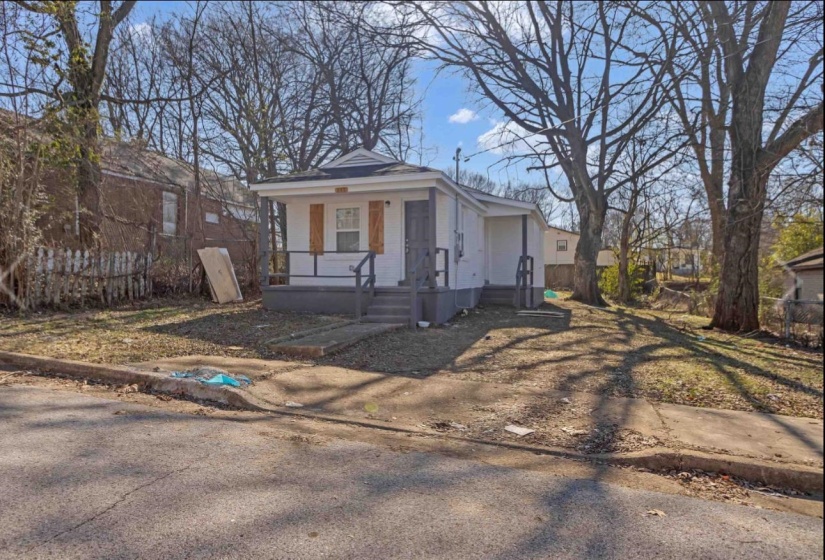 Shotgun-style home with a porch