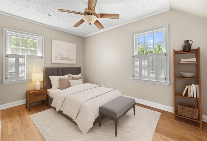 Have sweet dreams in the second bedroom complete with oriental molding, fresh neutral paint, hardwood floors, closet and ceiling fan. This room has been virtually staged.