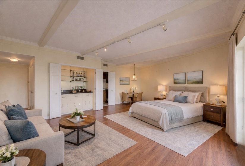 View of the third bedroom virtually staged to give you an idea of how the space looks furnished.
