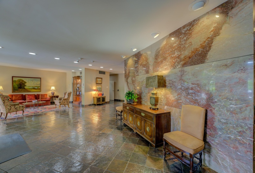 Step into Fairway Towers’ inviting main lobby, where timeless style meets everyday comfort. Featuring seating, warm lighting, and a welcoming atmosphere, this space sets the tone for the entire building.