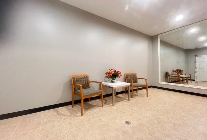 Living area featuring baseboards
